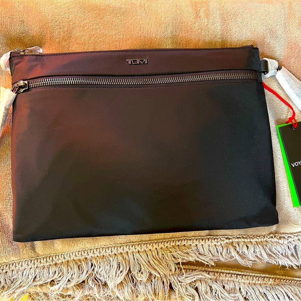 TUMI VOYAGEUR 
Black in color 
Authentic